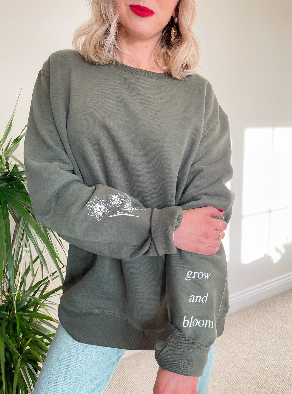 Grow and Bloom floral sleeve sweatshirt