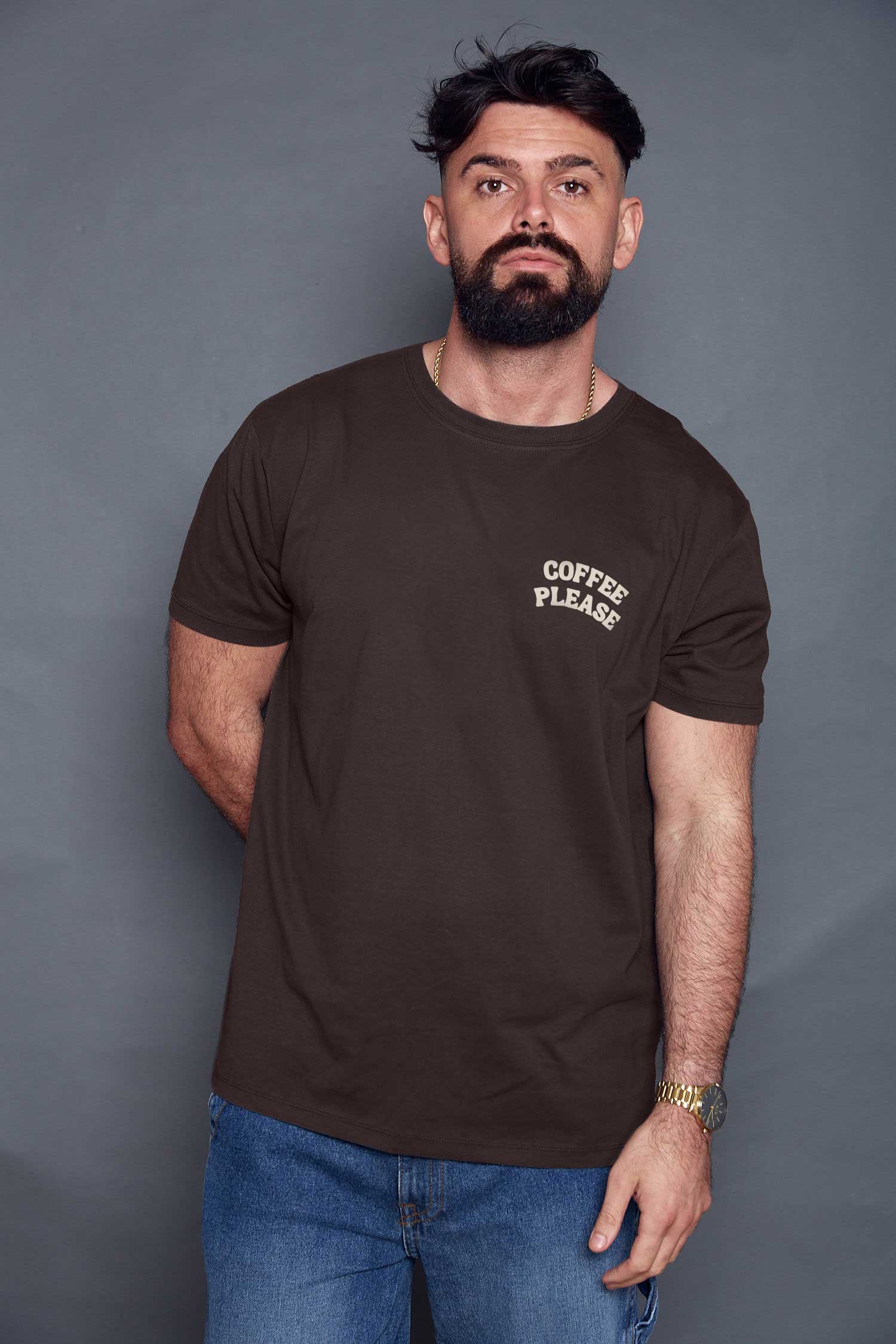 Man wearing a brown t-shirt with 'Coffee Please' text against a grey background