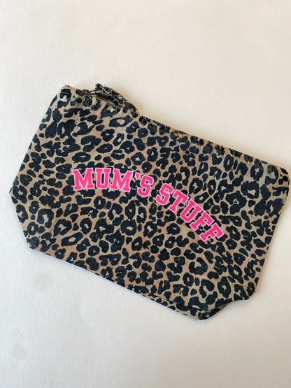 Leopard print pouch with 'Mum's Stuff' text in pink on a white background