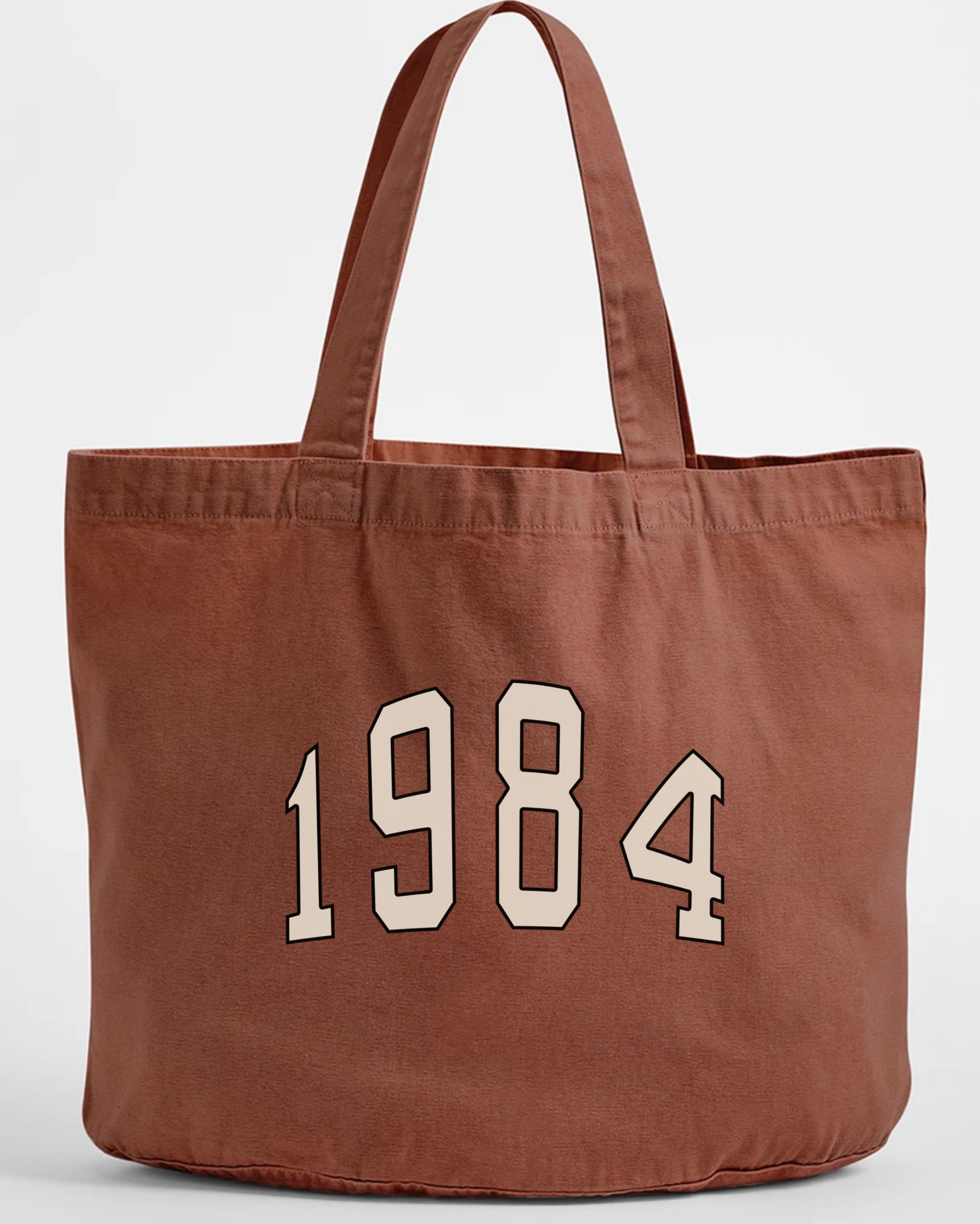denim, rust coloured tote bag with '1984' printed on it against a white background